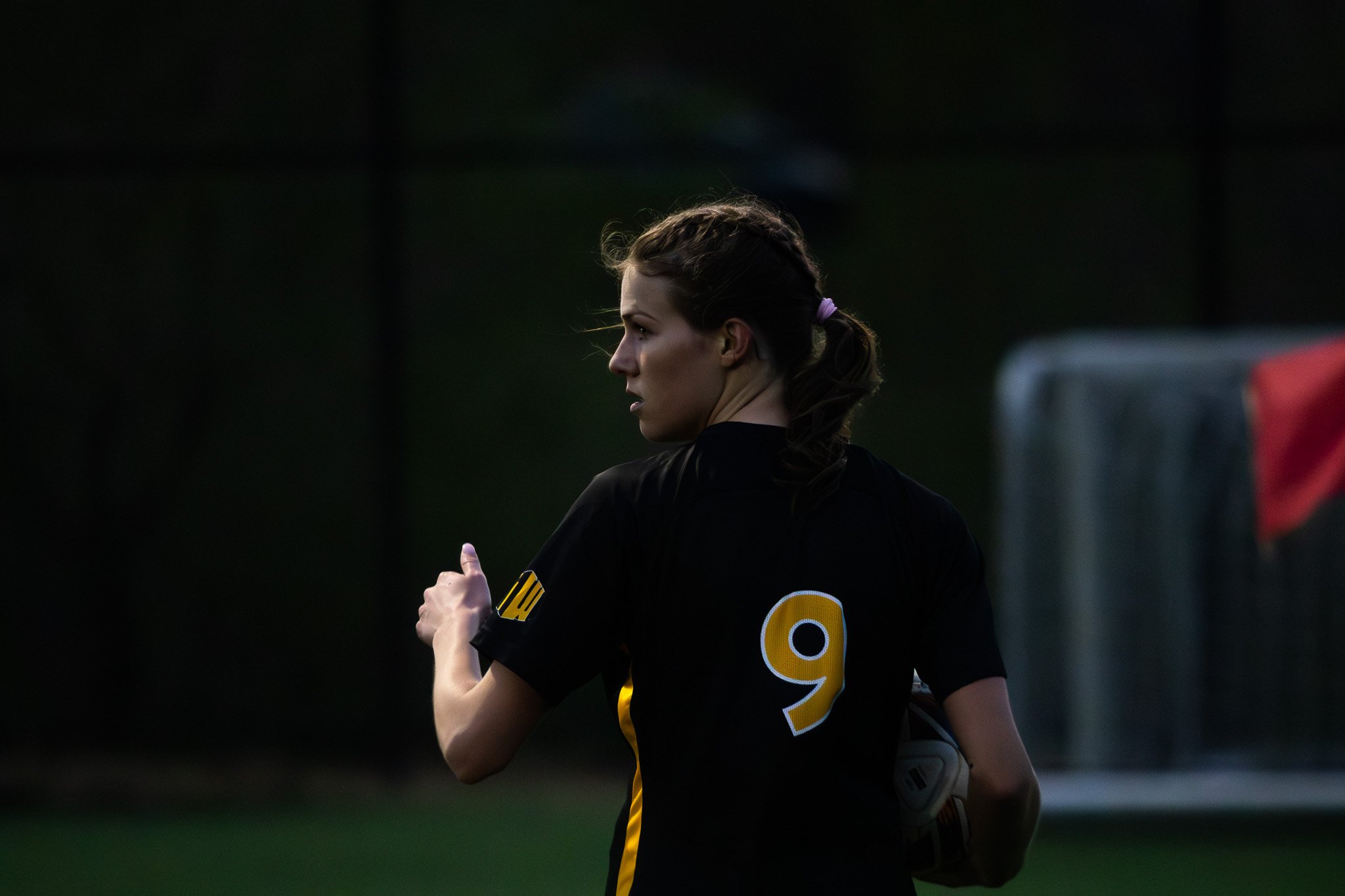 CC soccer player number 9 in action